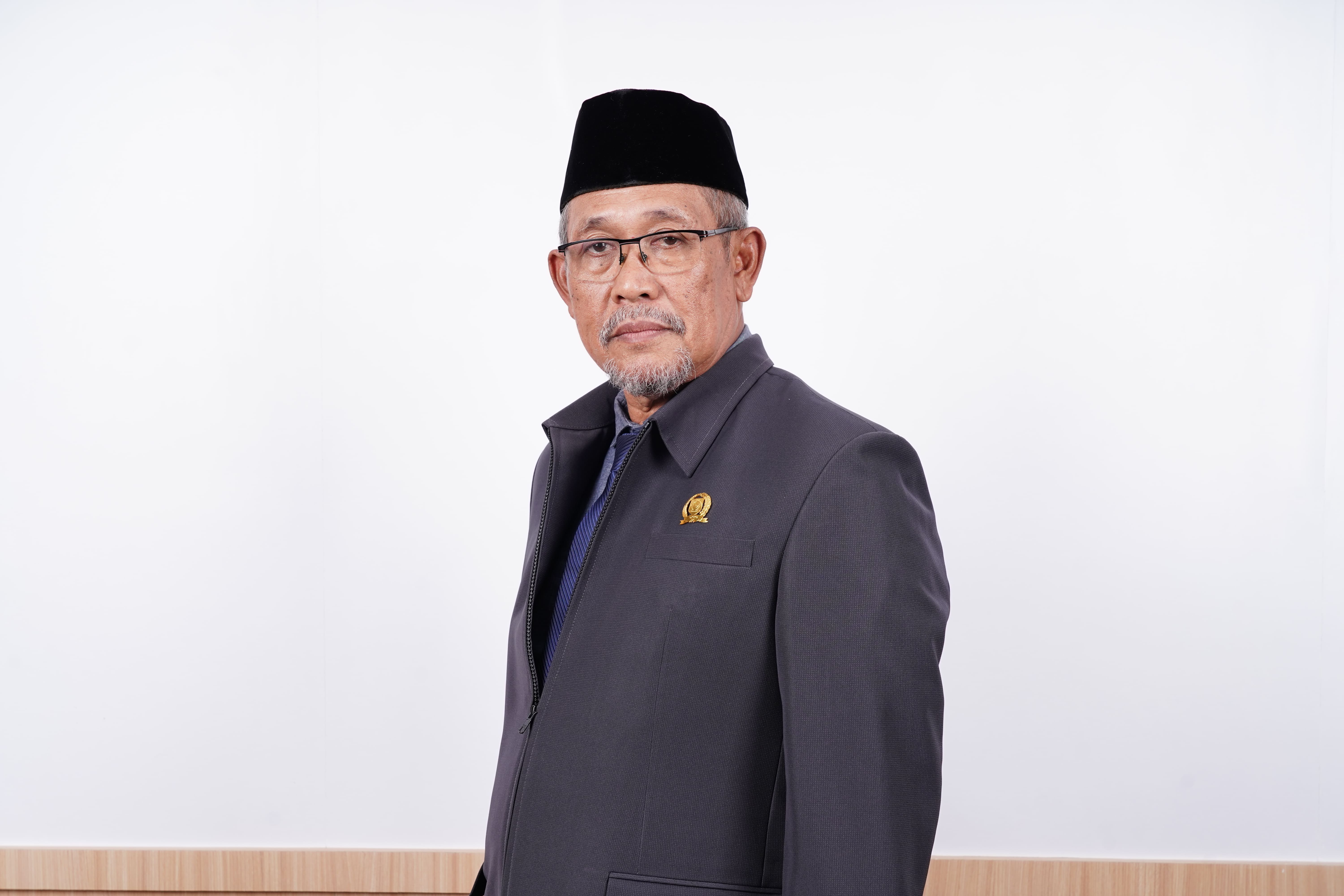 TAUFIK MARDIN, S.Sos