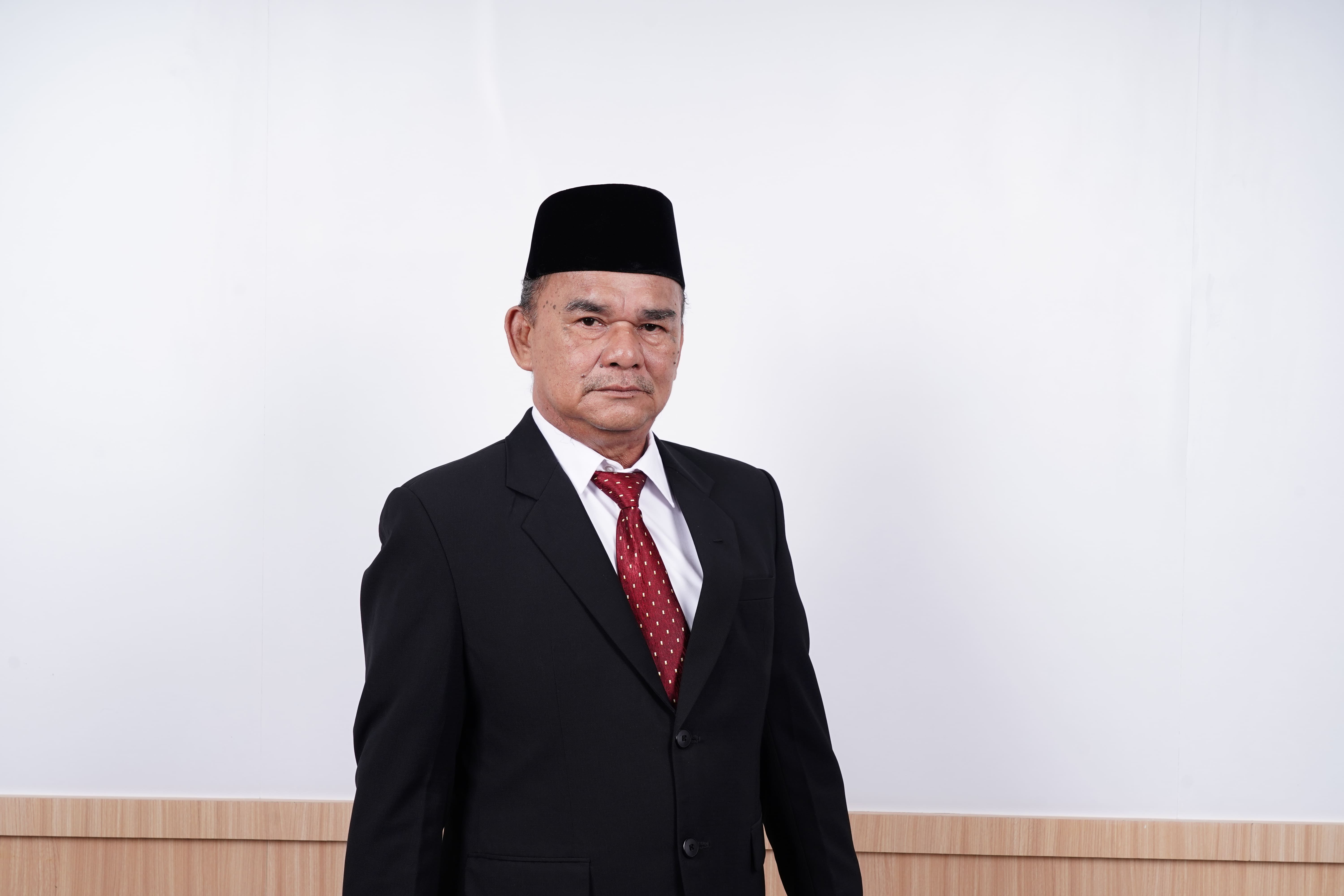 Drs. RUSTAMSYAH