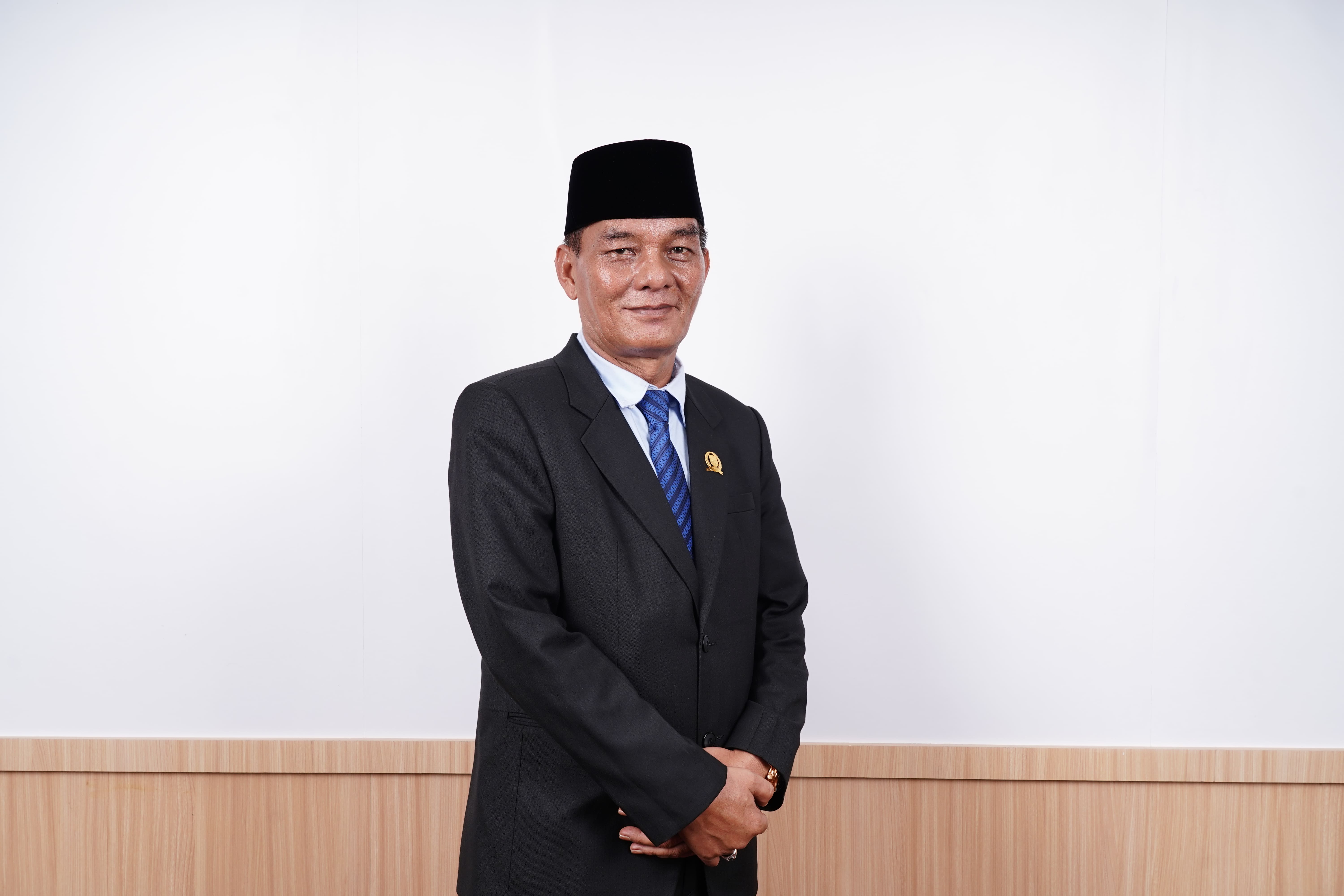 UCOK OKTAHABER,S.H.,M.H